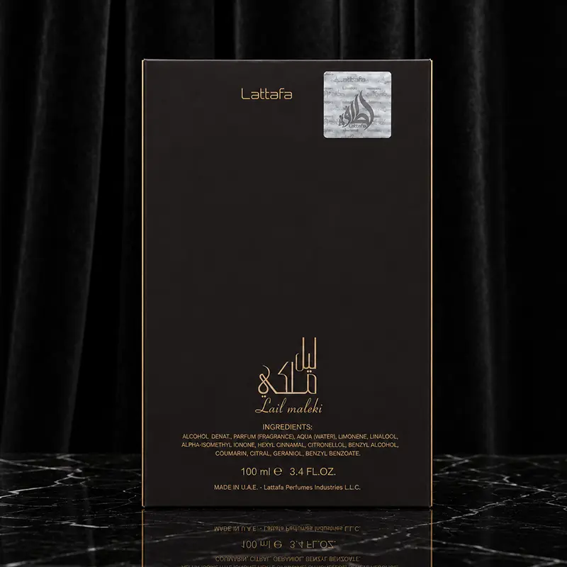 Back packaging; ingredients text, Lattafa mark, 100 ml size visible