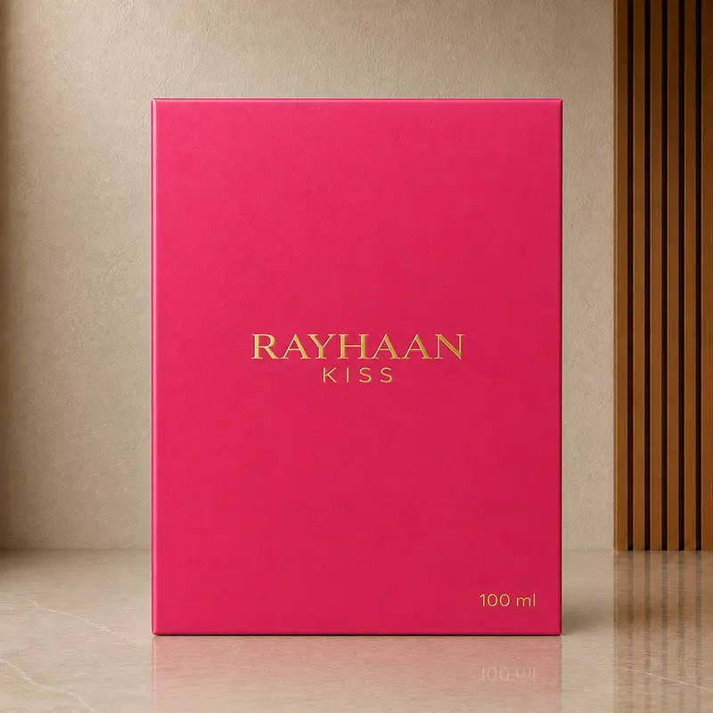 Pink Rayhaan Kiss inner box with gold lettering and visible 100 ml marking.