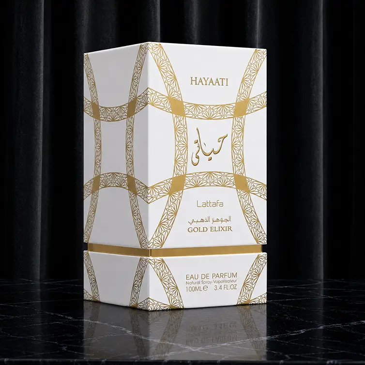 Angled box presentation revealing decorative golden textures and elegant packaging craftsmanship