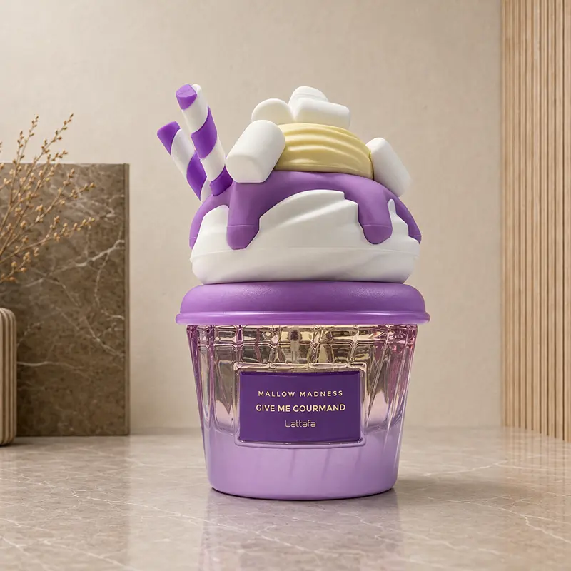 Purple and white Lattafa Mallow Madness bottle with a dessert-shaped cap on a stone surface.