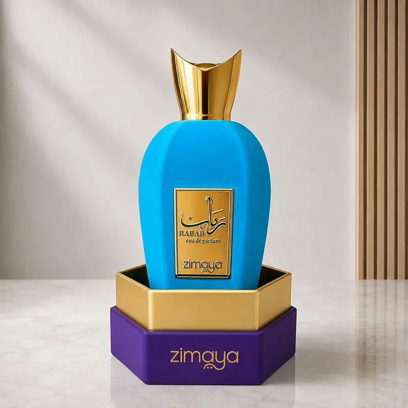 Turquoise Rabab bottle seated in gold and purple inner packaging on a marble studio surface.