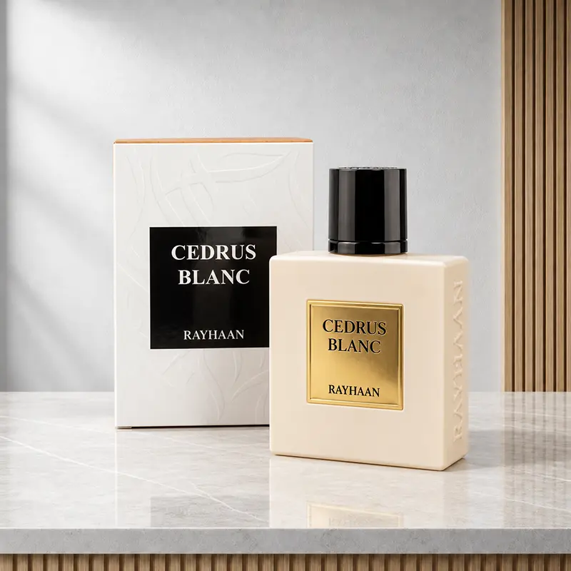Angled studio view of the Cedrus Blanc bottle and presentation box, showing the bottle’s side detail