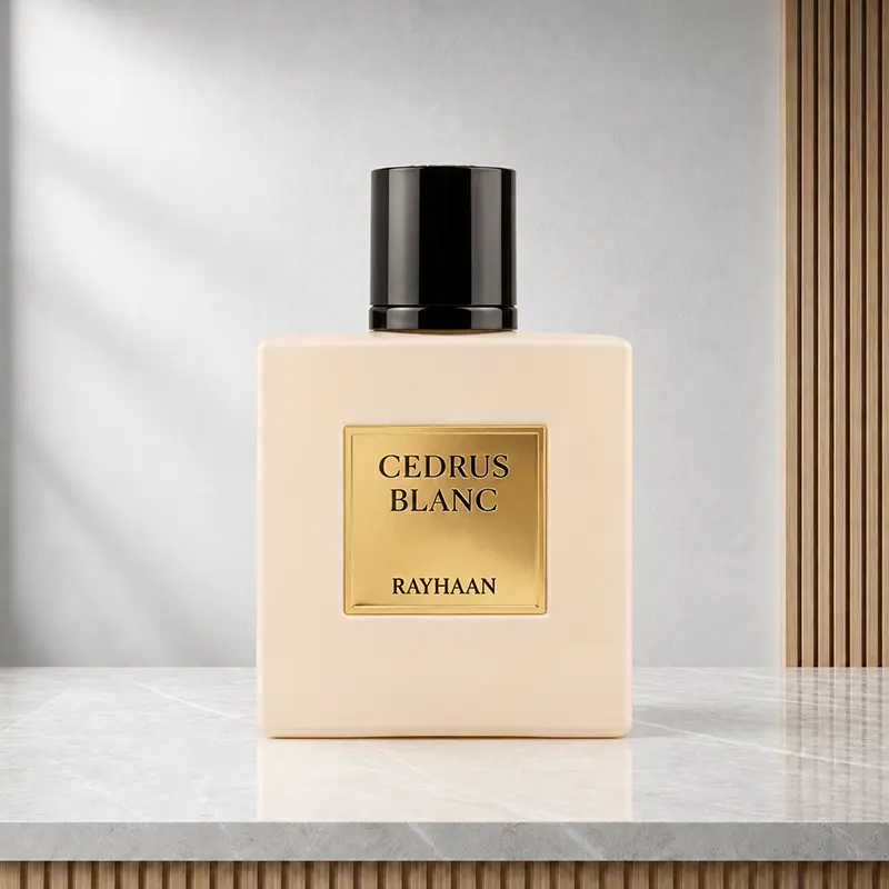 Front view of the ivory Rayhaan Cedrus Blanc bottle with glossy black cap and gold nameplate