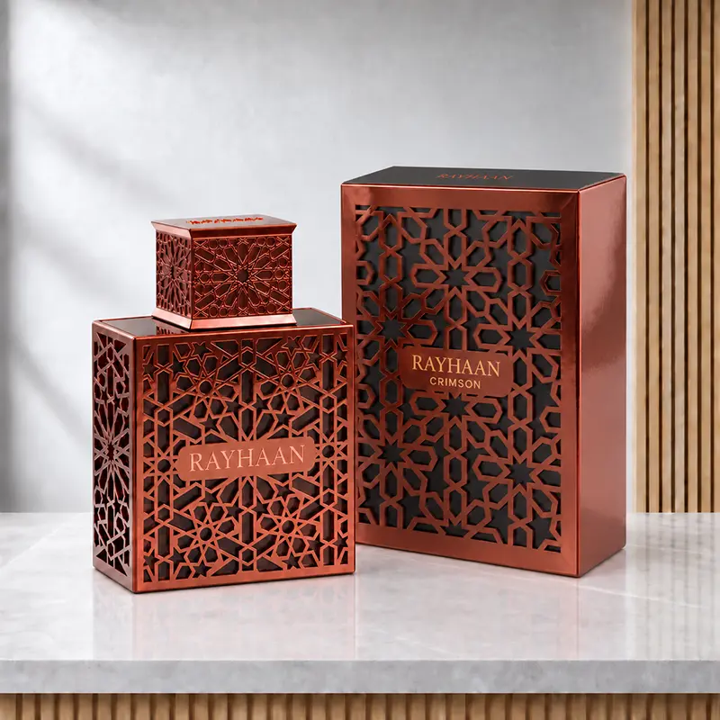 Rayhaan Crimson bottle beside its matching red-and-black box, both shown at an angle.