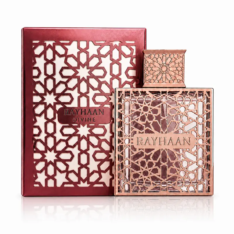 Rayhaan Divine 100ml EDP bottle and rose-red patterned box on white with a soft reflection.