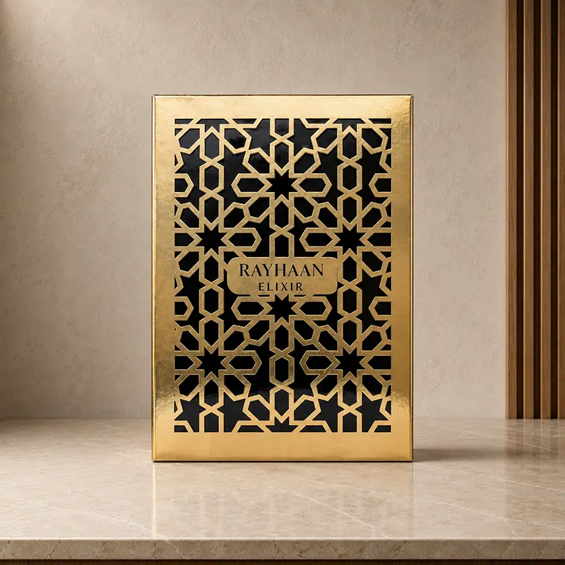Outer Rayhaan Elixir box shown from the front with a gold geometric pattern over black panels.