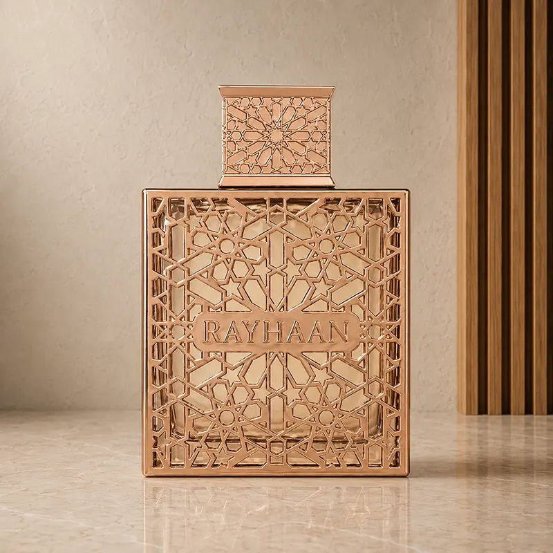 Rayhaan Divine bottle front with rose-gold geometric lattice and matching patterned cap.