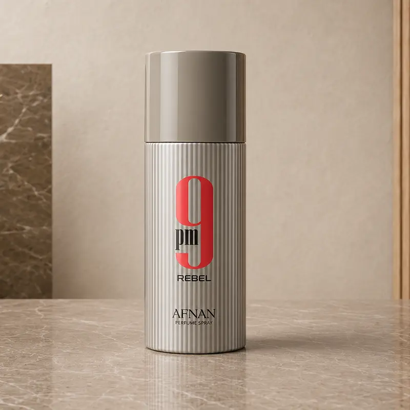 Ribbed silver 9PM Rebel spray can with red logo and Afnan branding