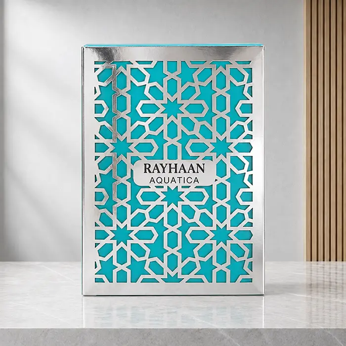 Front view of the silver and aqua Rayhaan Aquatica perfume box