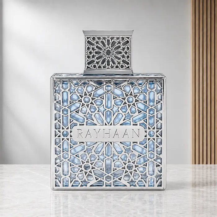 Front view of the silver and aqua Rayhaan Aquatica perfume bottle