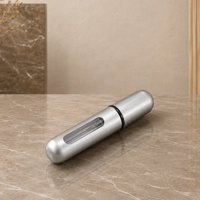 Travel perfume atomizer in silver from the Ishq Al Shuyukh Silver gift set.