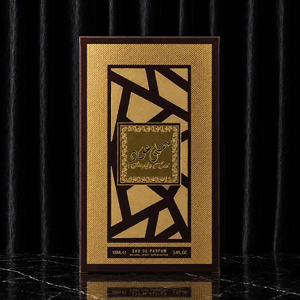 Front packaging box of Lattafa Simply Oud with gold and dark brown design