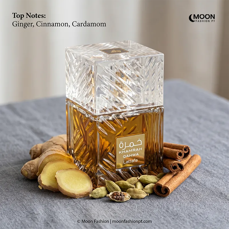 Freshly sliced ginger and aromatic cardamom pods highlighting the spicy top notes of Lattafa Khamrah Qahwa unisex EDP.