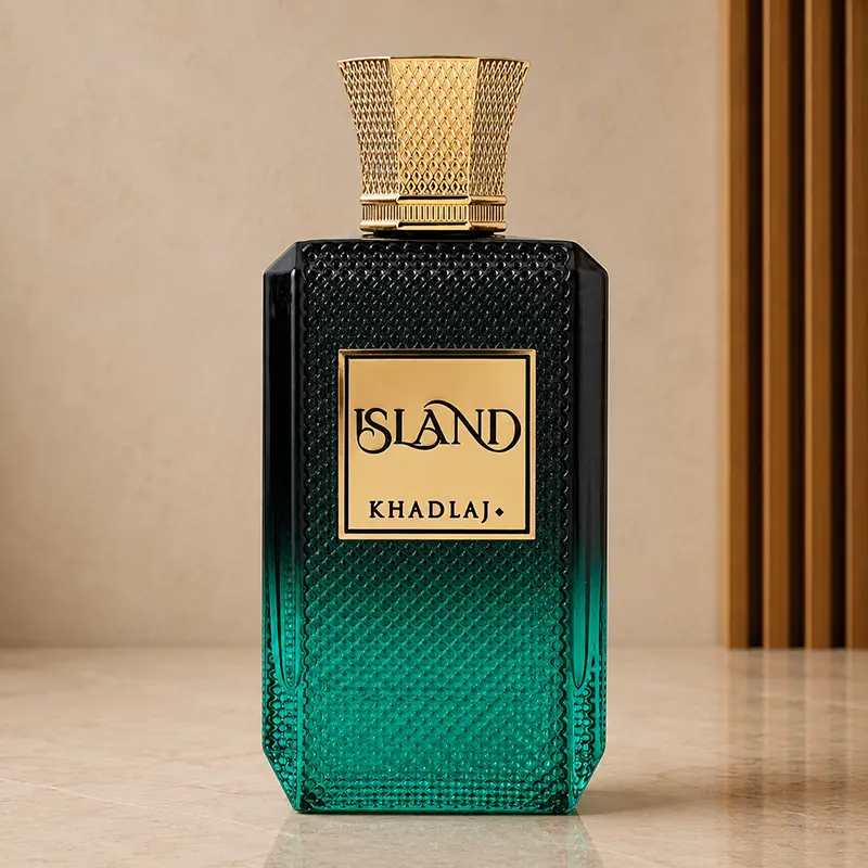 Khadlaj Island bottle shown straight-on with gold cap, plaque and teal textured glass.