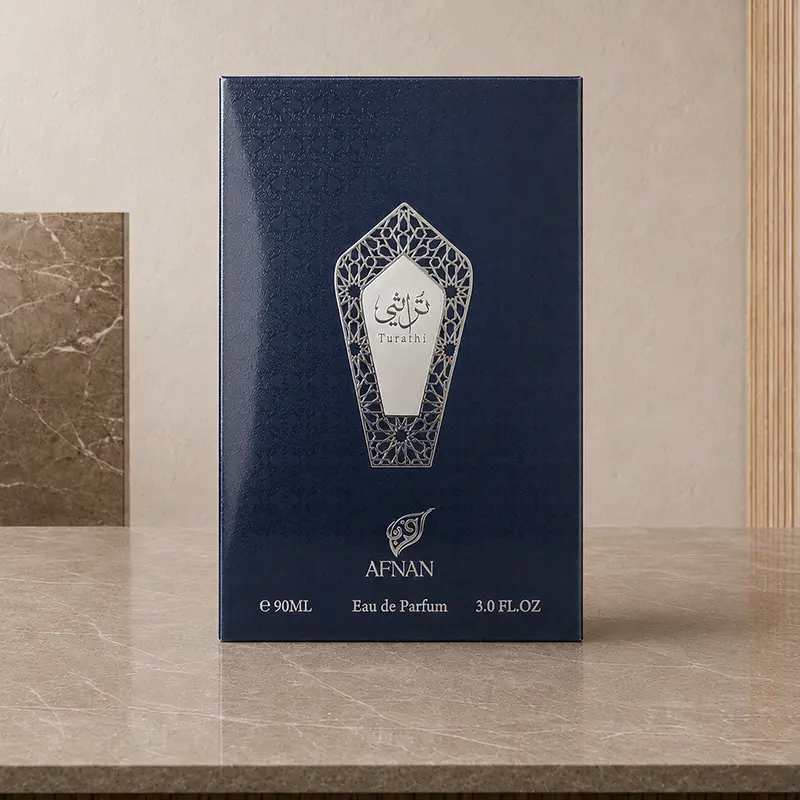 Navy Turathi Blue 90 ml Eau de Parfum box photographed straight on, with silver branding visible.