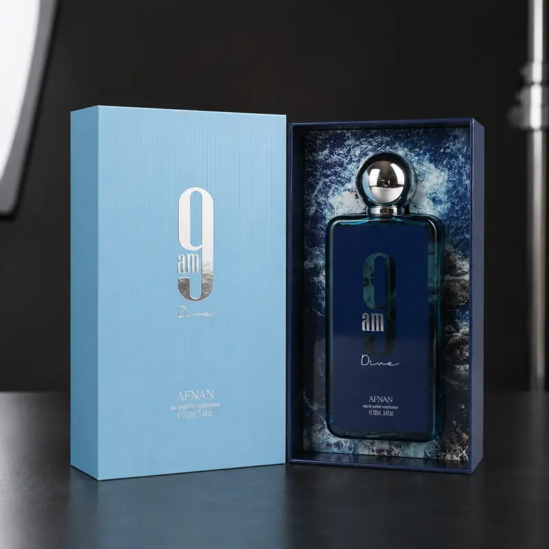 Complete unboxing experience showing the inner structural packaging and Afnan 9 AM Dive bottle resting securely inside.