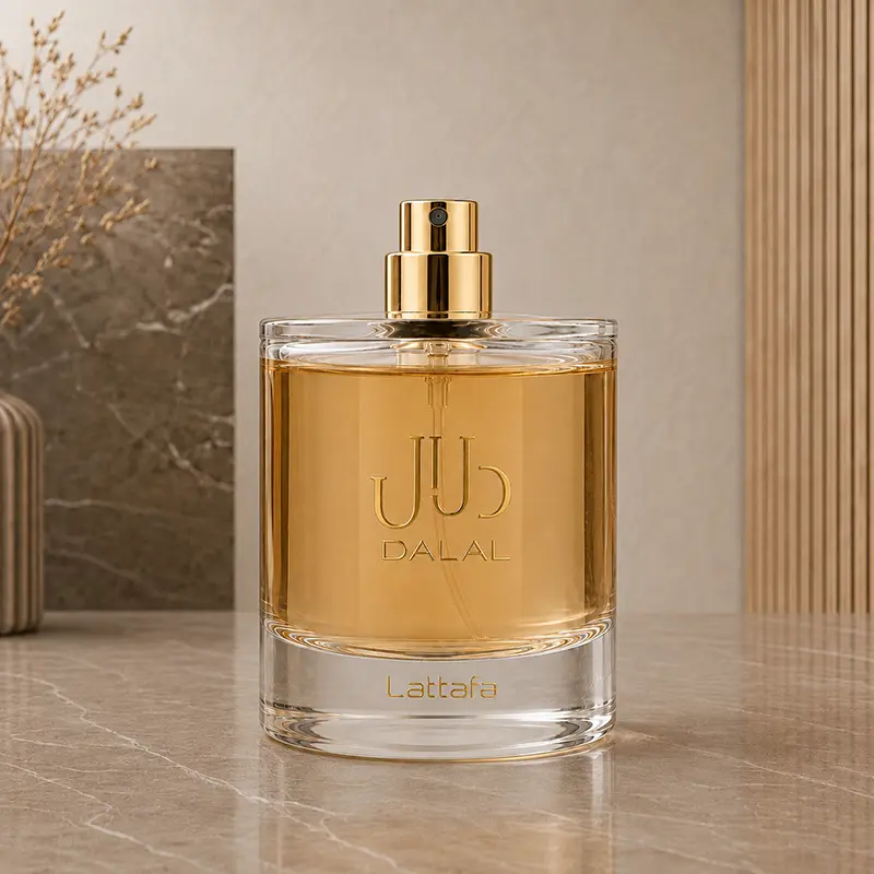 Uncapped Lattafa Dalal bottle with the gold-coloured spray nozzle visible above amber liquid