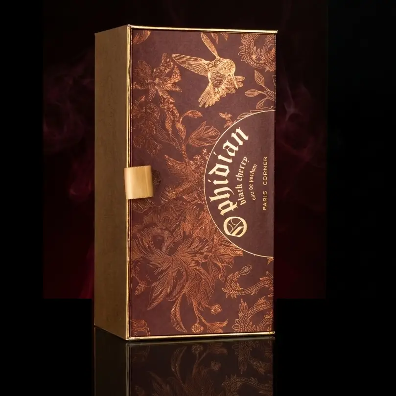 Luxurious gold hummingbird textured box for Paris Corner Ophidian Black Cherry unisex perfume.