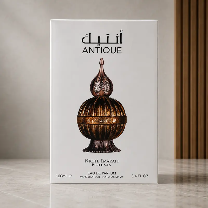 White Antique retail box front with bottle artwork, Niche Emarati branding and Eau de Parfum text.
