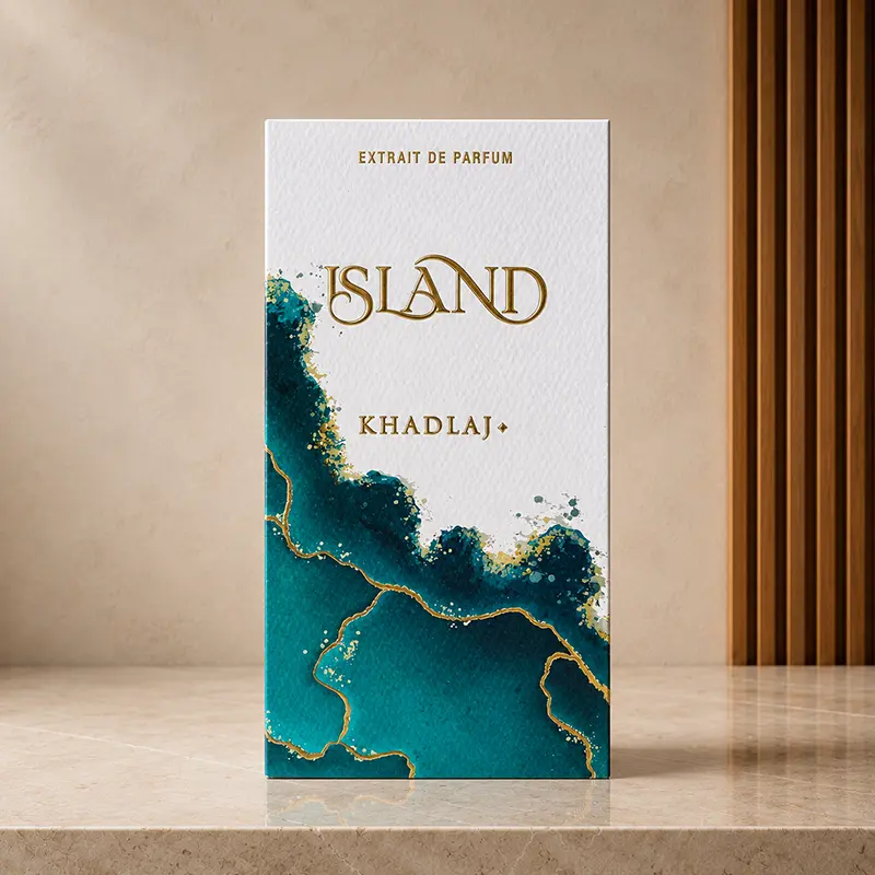 Khadlaj Island box shown straight-on with white, teal and gold artwork and visible branding.